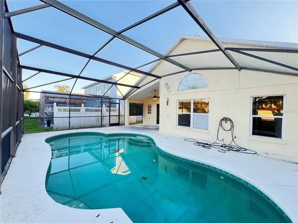 a view of a house with a swimming pool