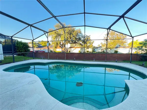 a view of outdoor space with swimming pool