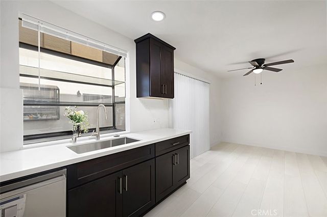 a bathroom with a double vanity sink and mirror