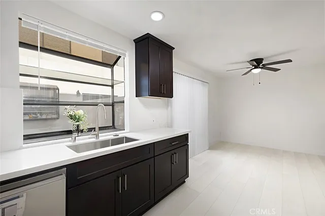 a bathroom with a double vanity sink and mirror