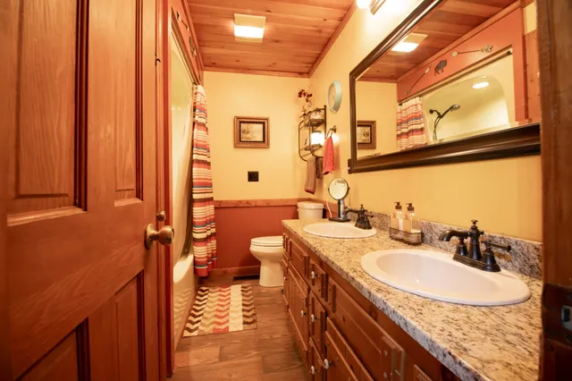 a view of a swimming pool with an outdoor space and seating area