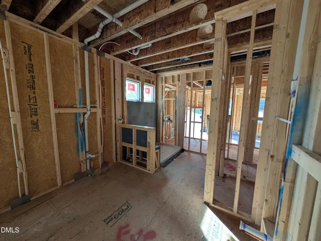 a view of a room with wooden walls