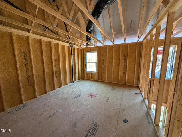a view of swimming pool with seating space