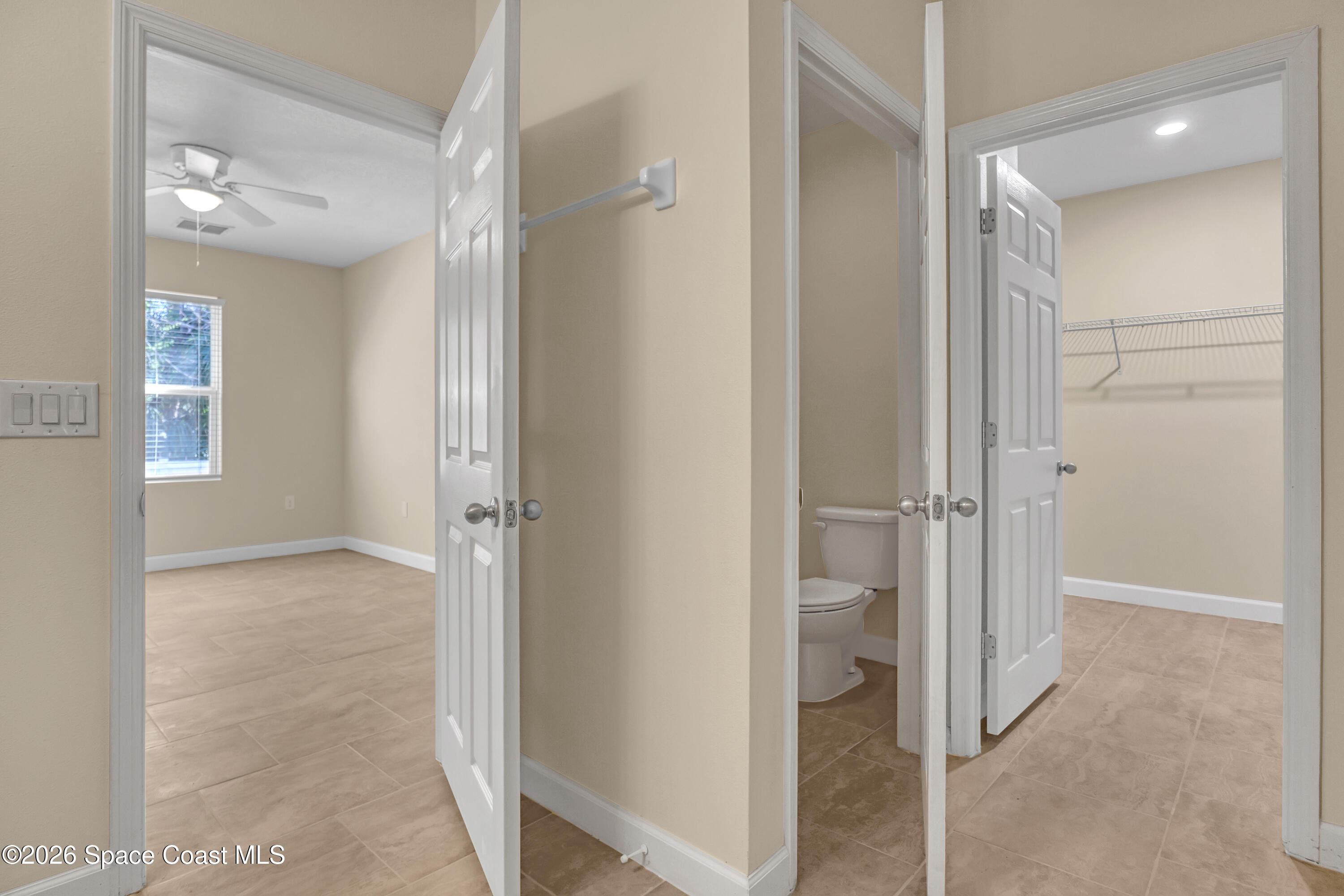 2605 Falcon Lane Mims, FL 32754 - Photo 17 of 29 a view of a hallway with closet and bathroom