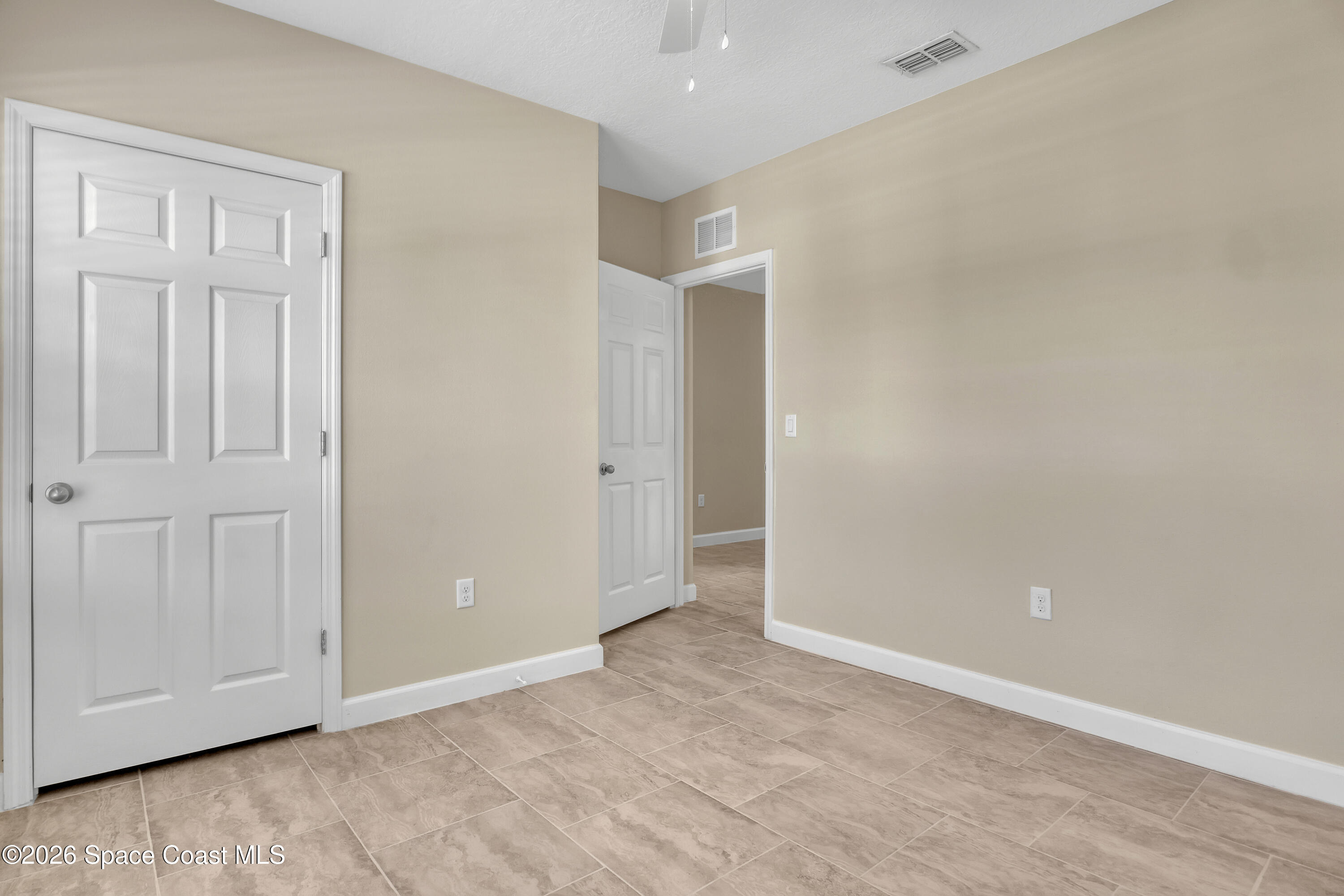 2605 Falcon Lane Mims, FL 32754 - Photo 23 of 29 an empty room with window