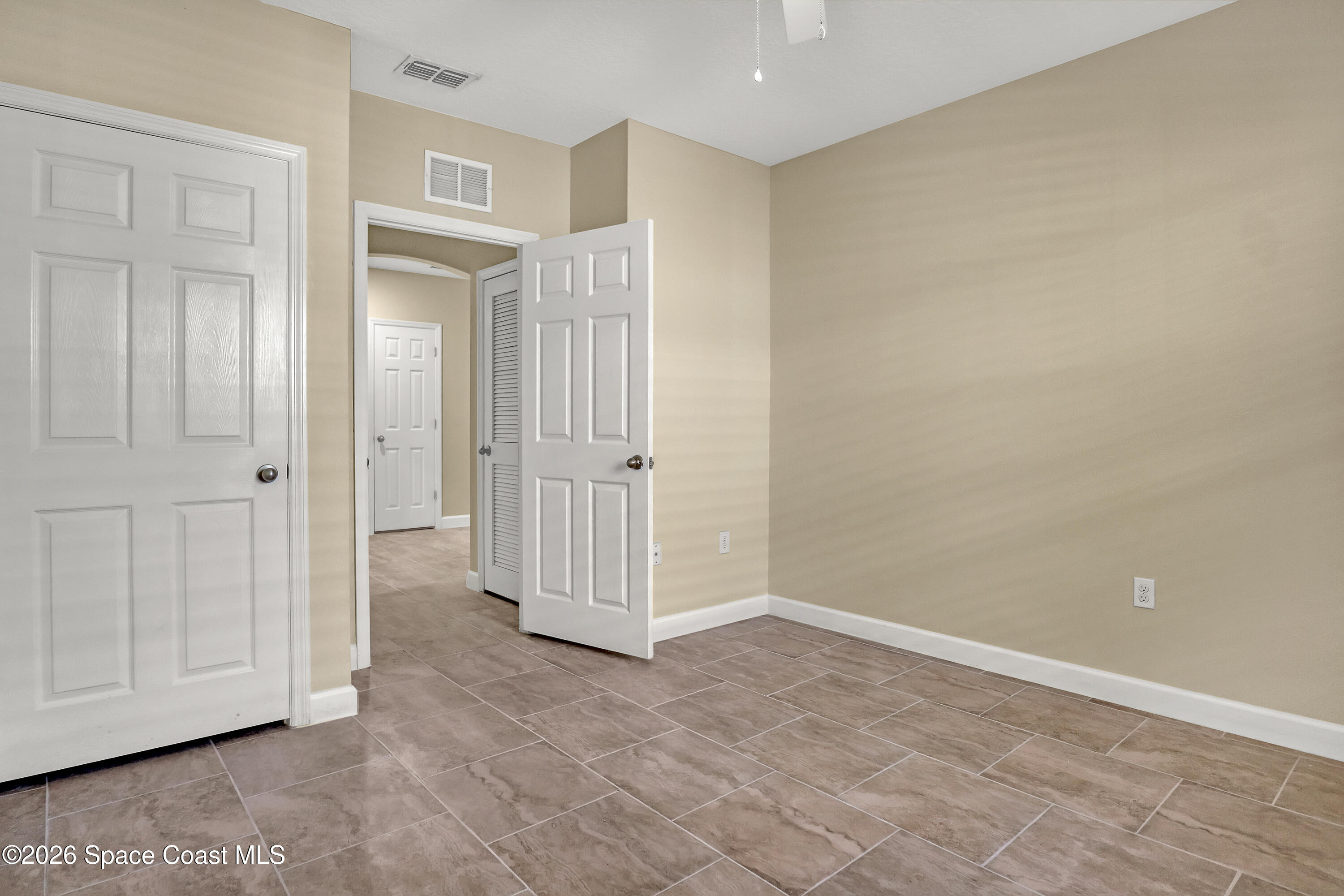 2605 Falcon Lane Mims, FL 32754 - Photo 25 of 29 a view of entryway with wooden floor