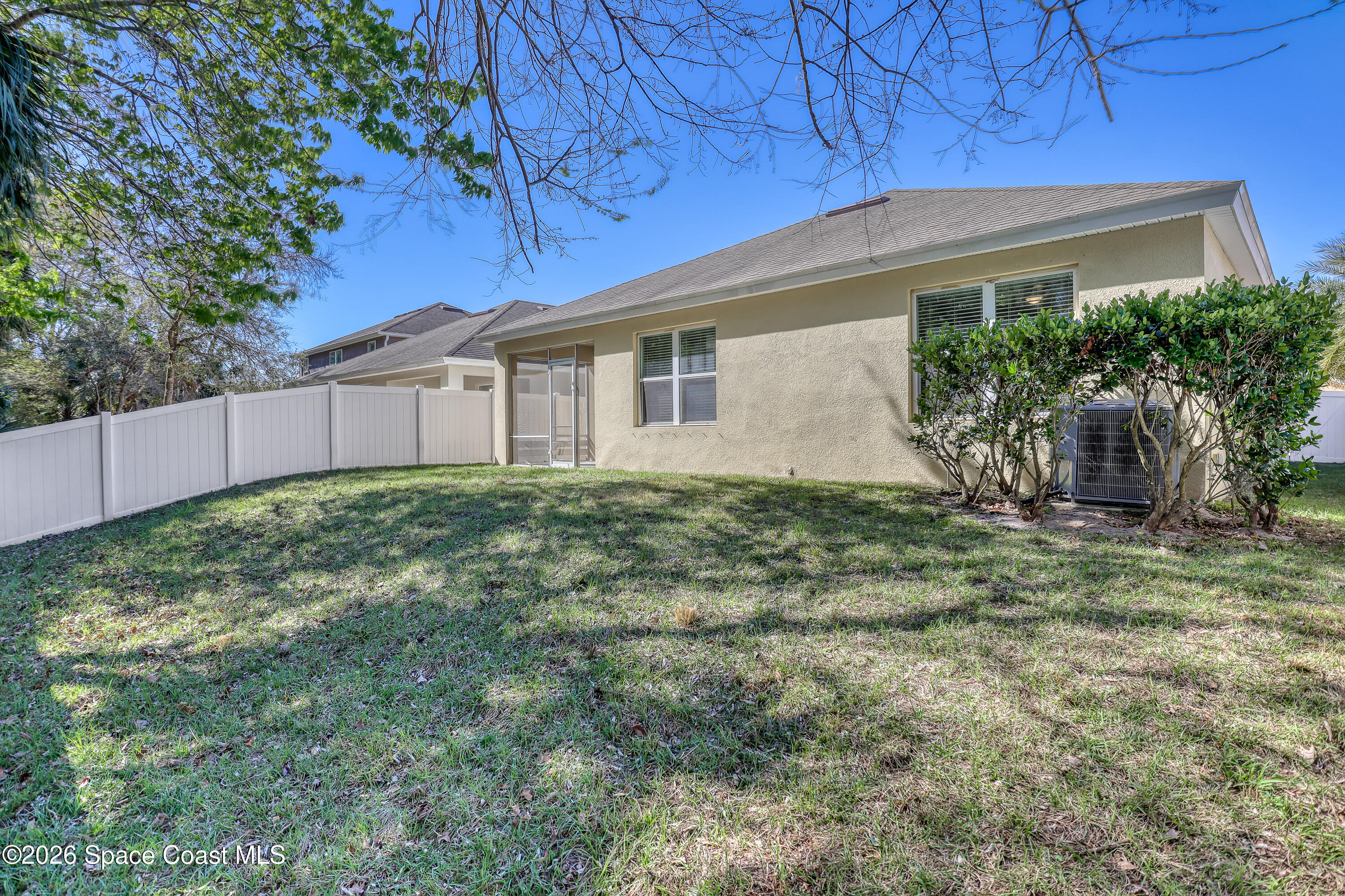 2605 Falcon Lane Mims, FL 32754 - Photo 28 of 29 a view of a house with a yard