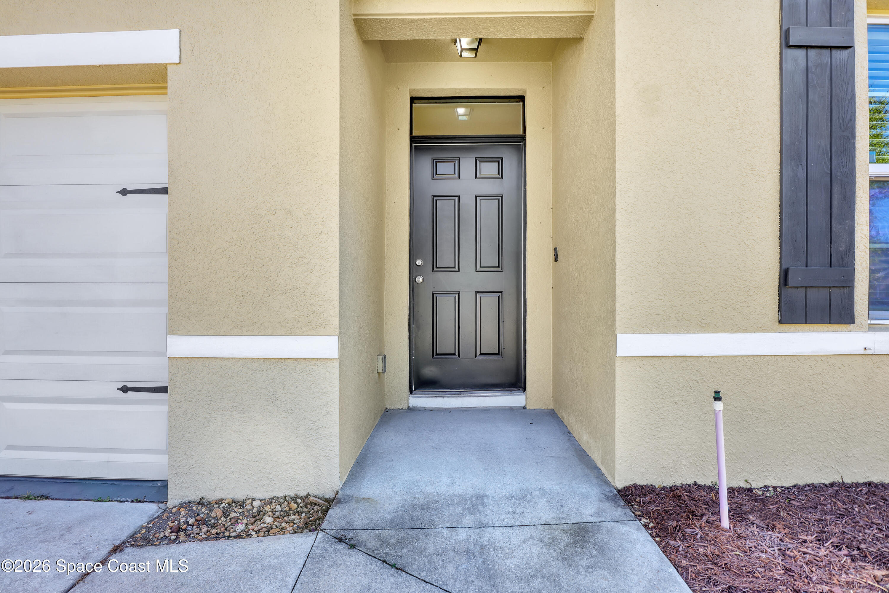 2605 Falcon Lane Mims, FL 32754 - Photo 4 of 29 a view of a hallway with entryway of the house