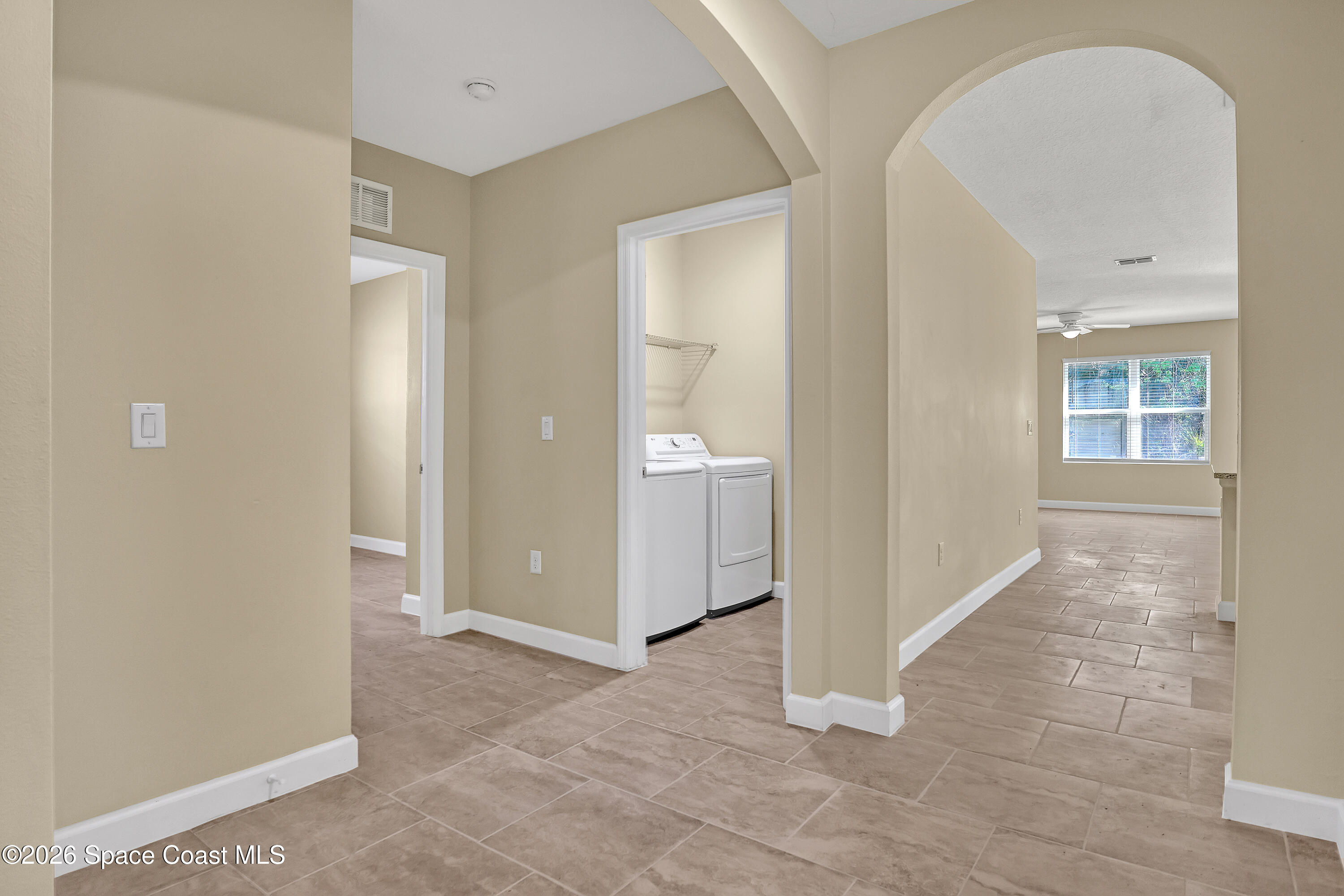 2605 Falcon Lane Mims, FL 32754 - Photo 6 of 29 an empty room with windows and closet