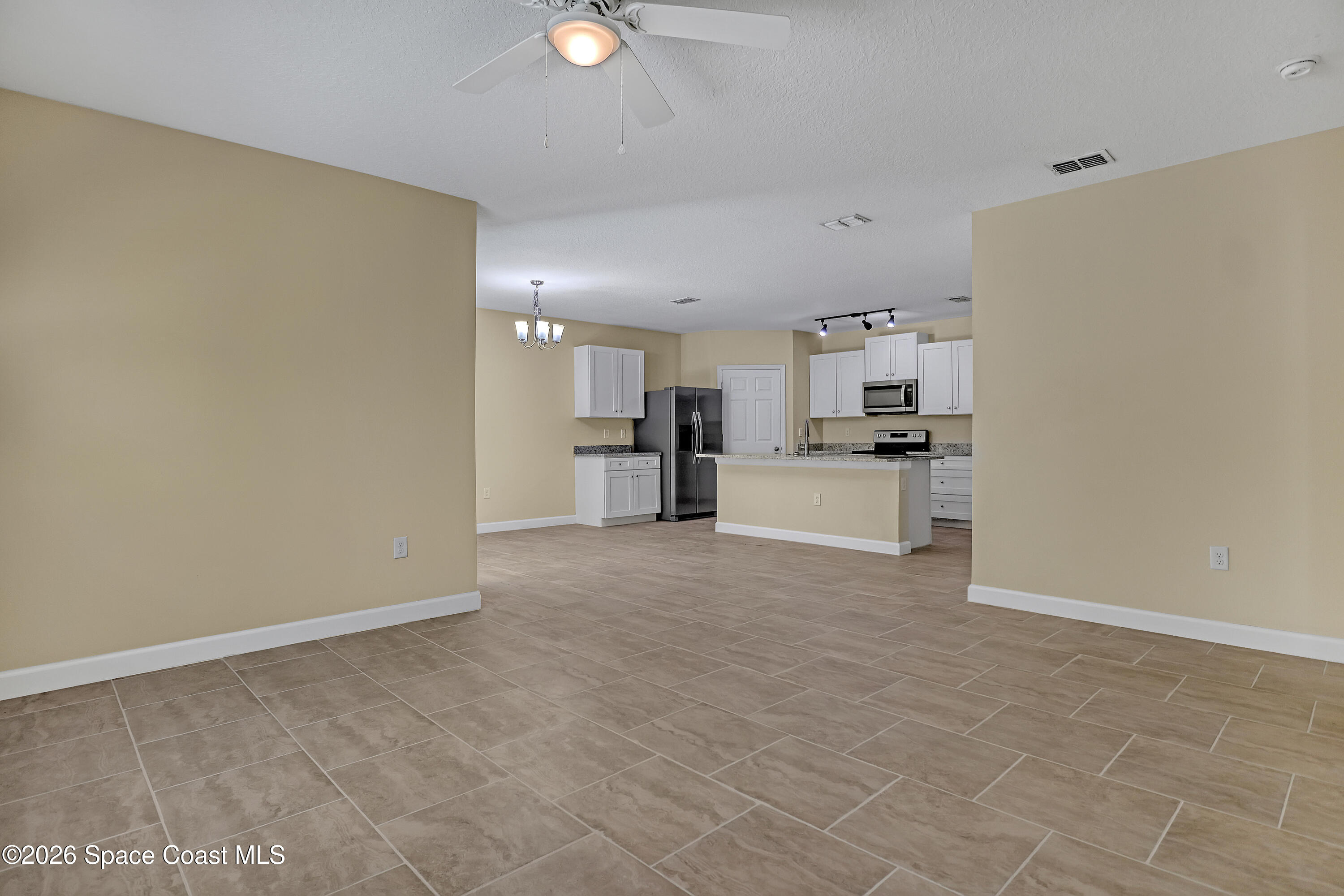 2605 Falcon Lane Mims, FL 32754 - Photo 10 of 29 a view of a kitchen with a sink