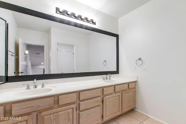 a view of a house with pool and sitting area