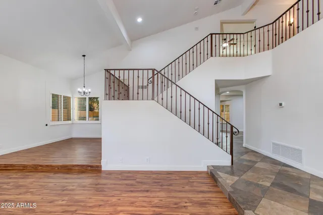 a living room with furniture a window and a fireplace