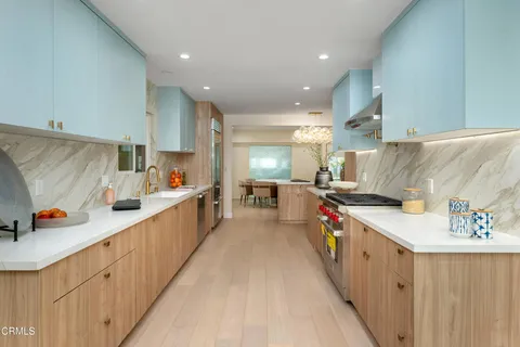 a spacious bedroom with a bed and a window