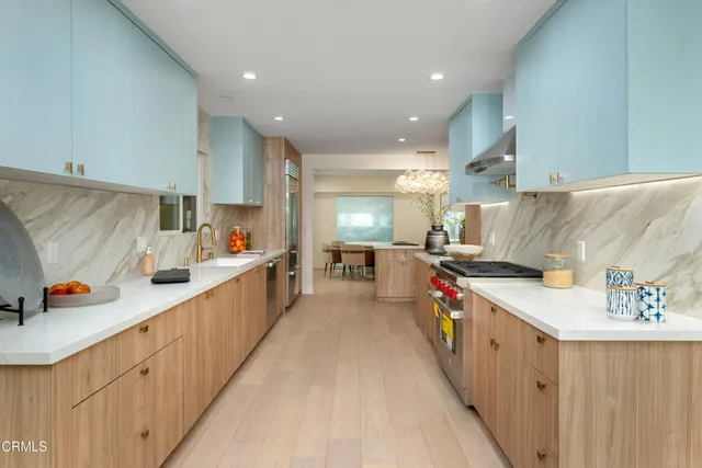 a spacious bedroom with a bed and a window