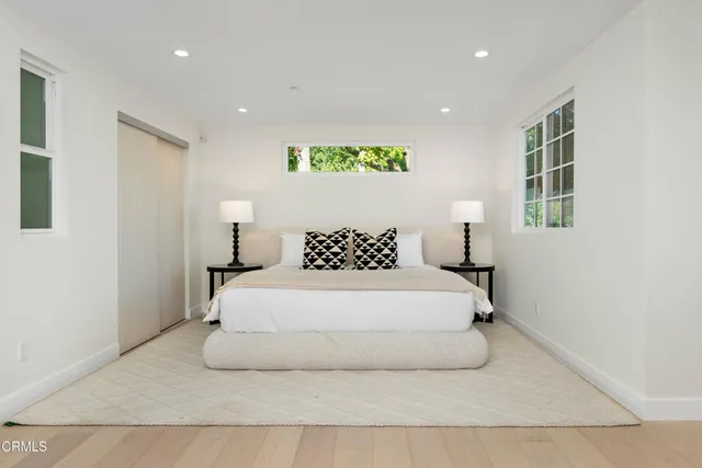 a view of a workspace with furniture and bathroom