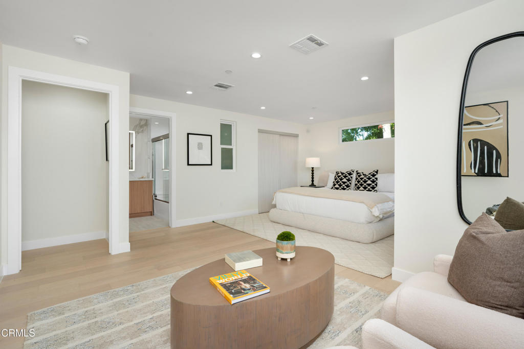 875 San Simeon Road Arcadia, CA 91007 - Photo 19 of 60 a living room with furniture and wooden floor