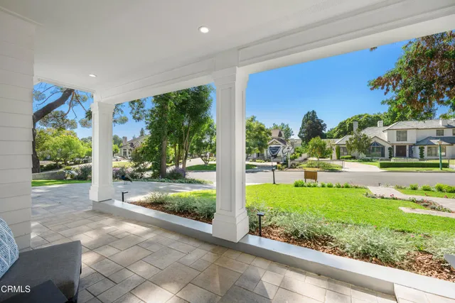 a view of a porch with a backyard