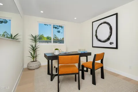a view of a storage & utility room with a window