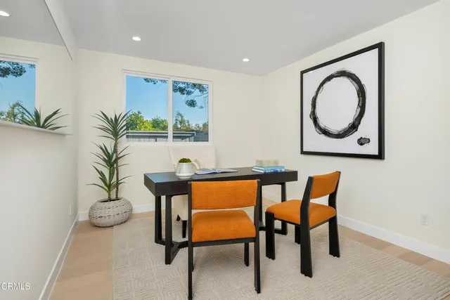 a view of a storage & utility room with a window