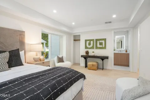 a view of kitchen with furniture and a potted plant