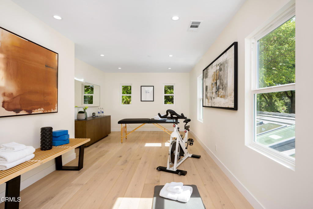 875 San Simeon Road Arcadia, CA 91007 - Photo 36 of 60 a view of a room with gym equipment and a large window