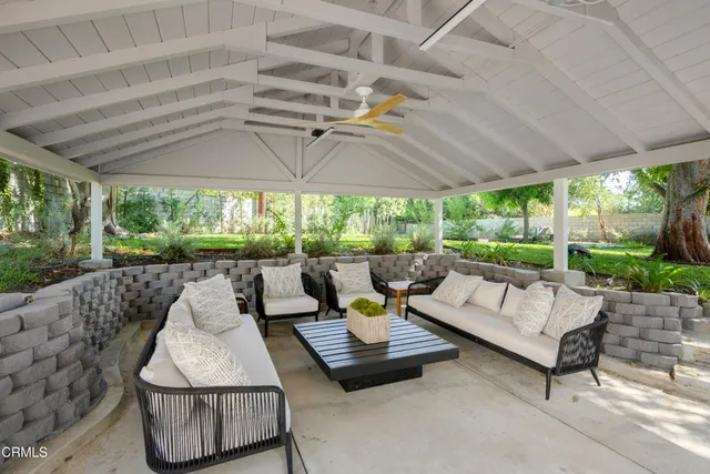 an aerial view of residential house with outdoor space