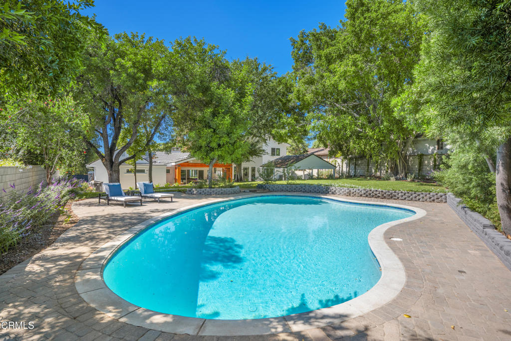 875 San Simeon Road Arcadia, CA 91007 - Photo 50 of 60 a view of a swimming pool with a yard