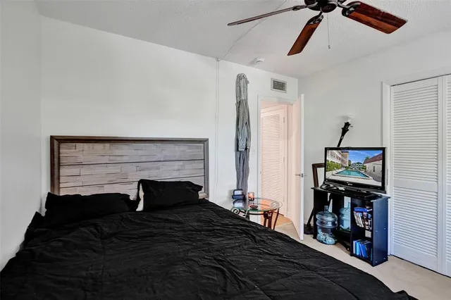 a living room with furniture fireplace and rug