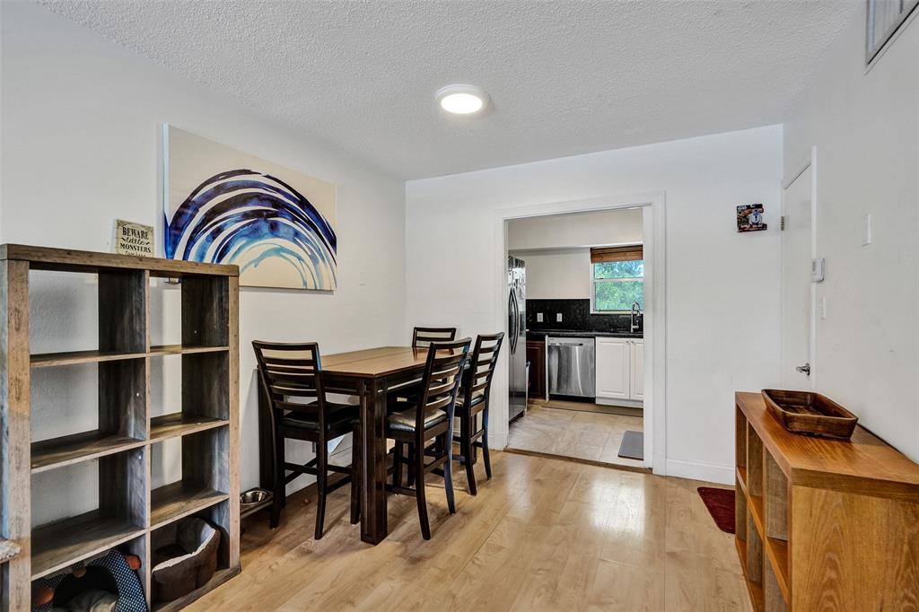 601 Southeast 5th Court, Unit 309 Fort Lauderdale, FL 33301 - Photo 6 of 17 a dining room with furniture and window