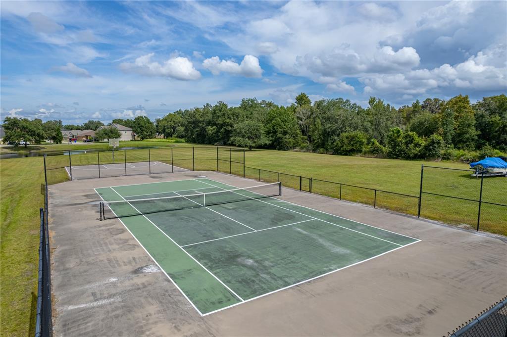 4734 Lathloa Loop Lakeland, FL 33811 - Photo 85 of 87 a view of a tennis court