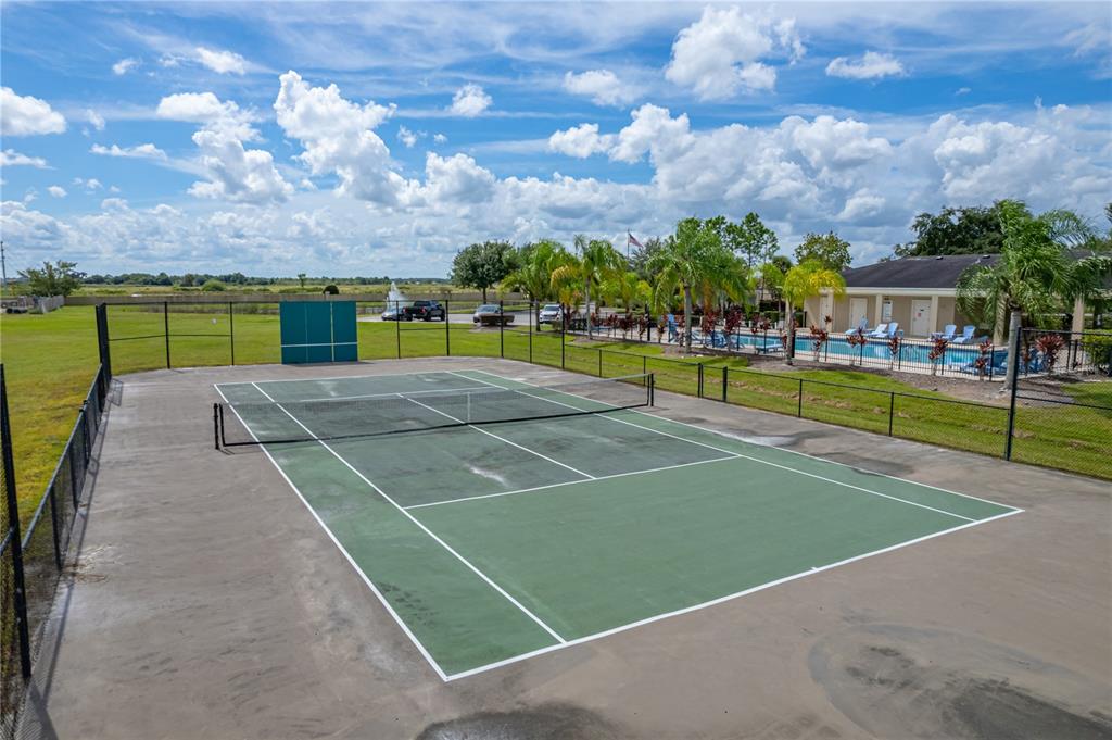 4734 Lathloa Loop Lakeland, FL 33811 - Photo 86 of 87 a view of a tennis court