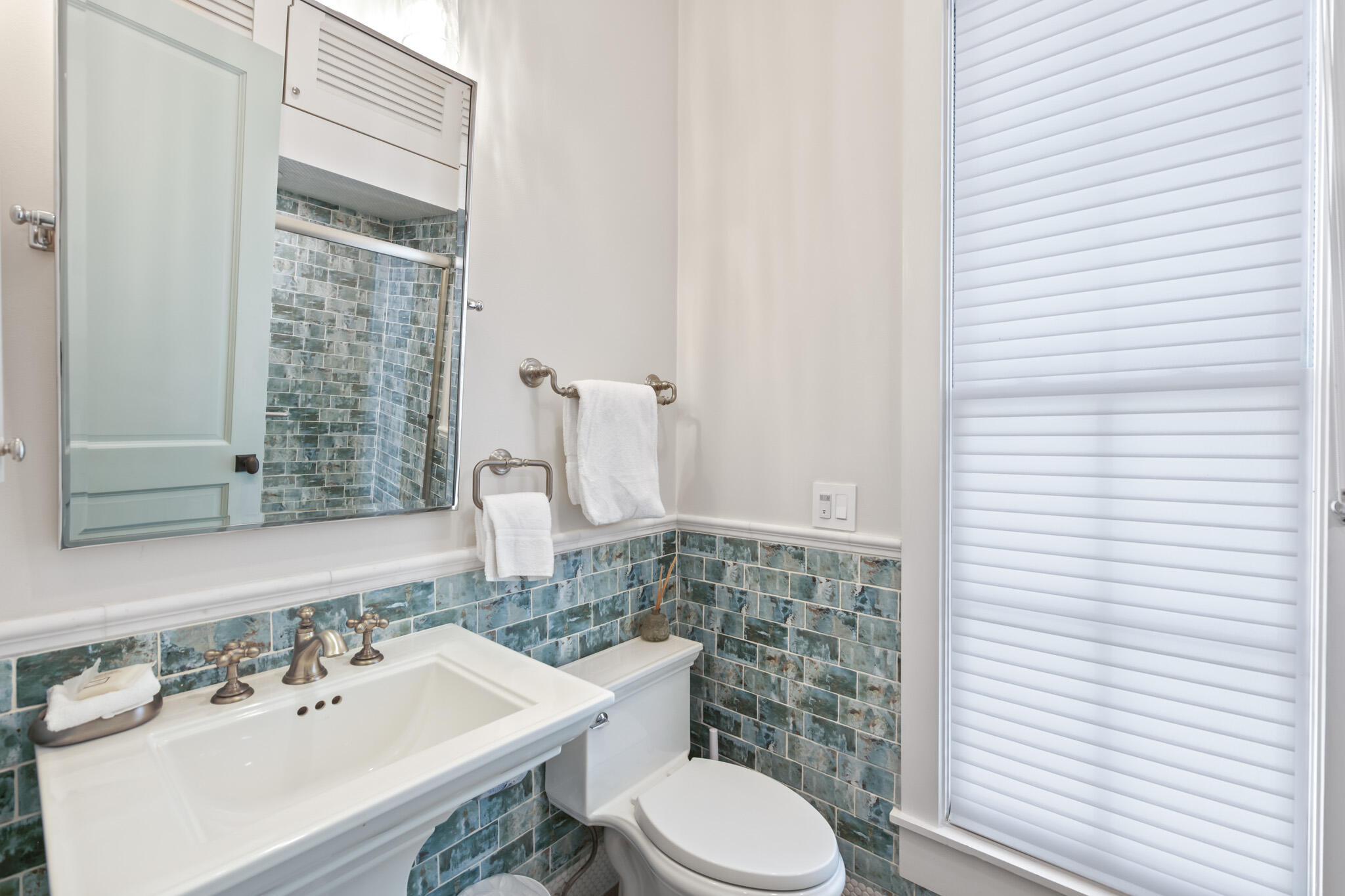 72 Windward Lane Inlet Beach, FL 32461 - Photo 18 of 88 a bathroom with a sink a toilet and shower curtain