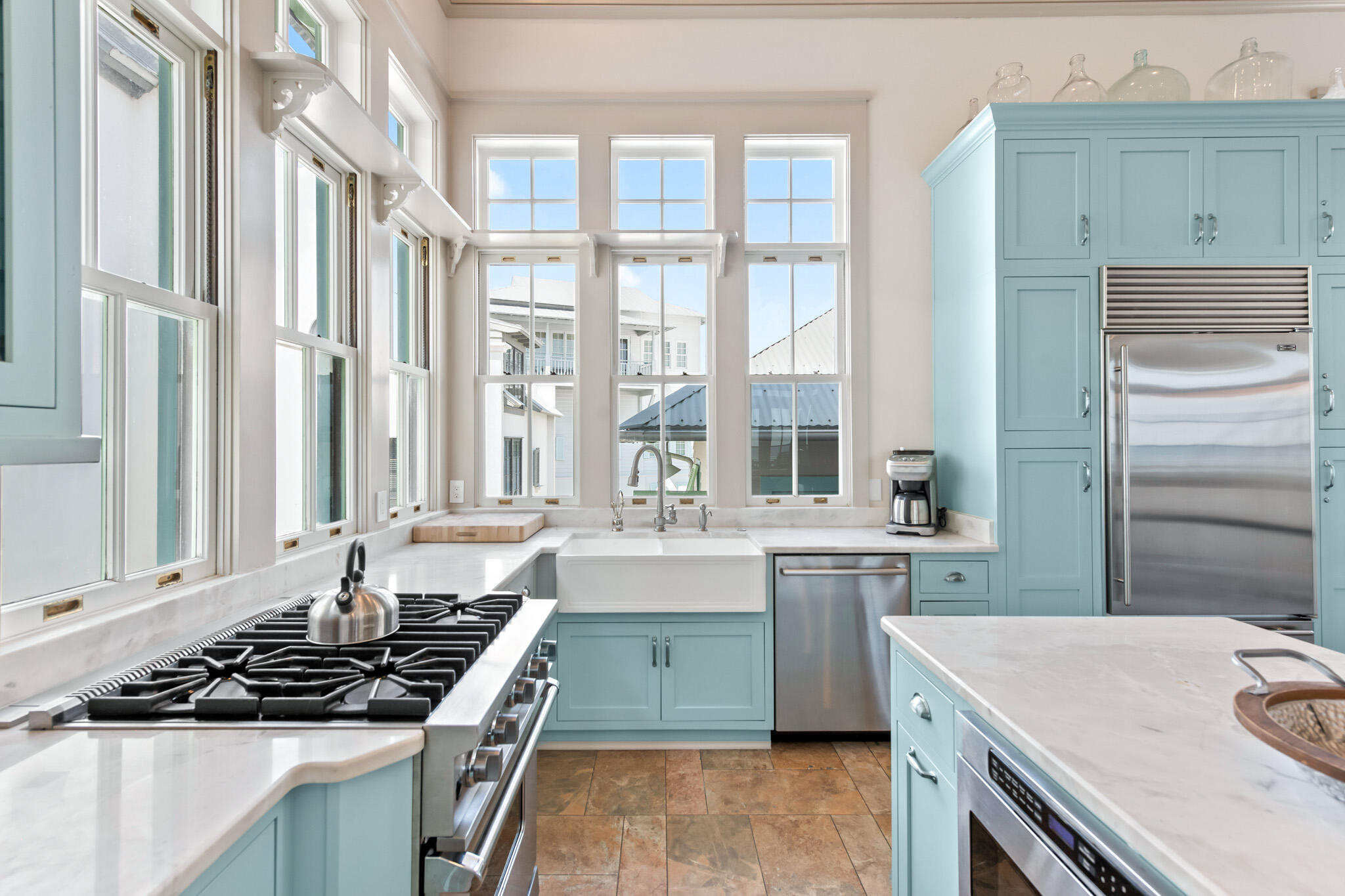 72 Windward Lane Inlet Beach, FL 32461 - Photo 32 of 88 a kitchen with a stove a sink and a refrigerator