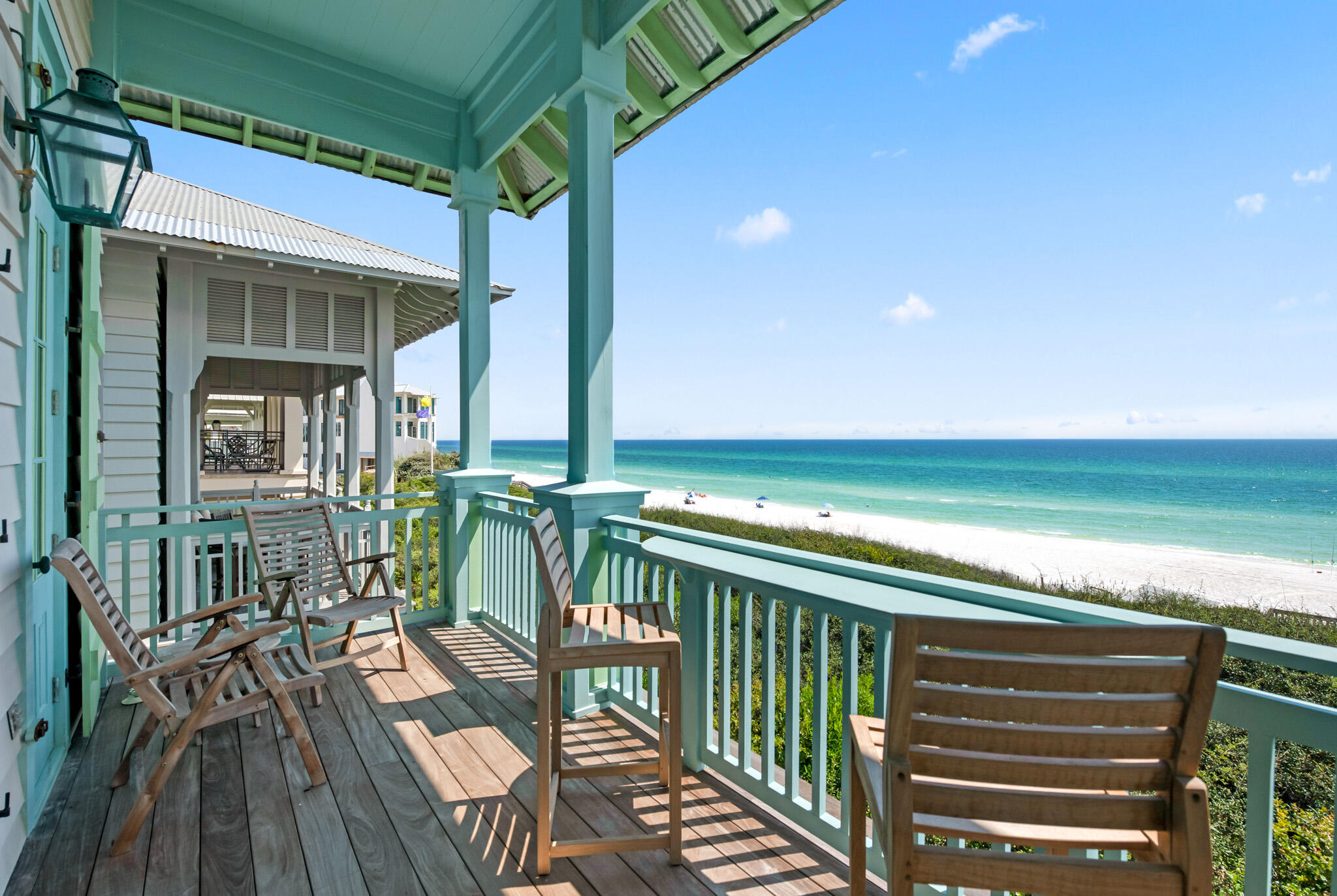 72 Windward Lane Inlet Beach, FL 32461 - Photo 51 of 88 a view of balcony with chairs and wooden floor
