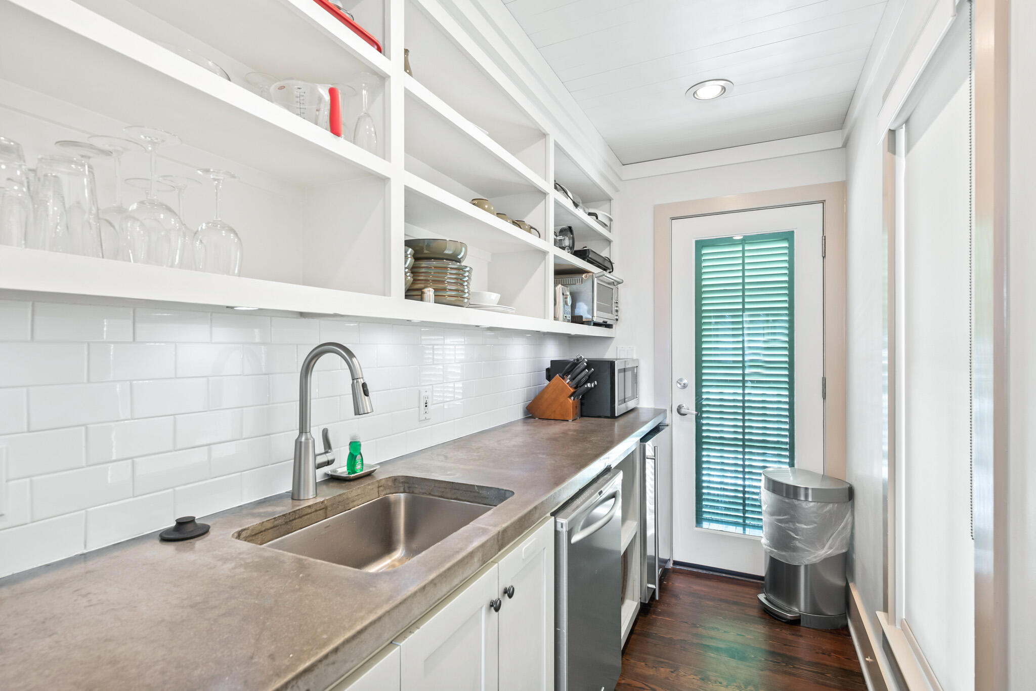 72 Windward Lane Inlet Beach, FL 32461 - Photo 71 of 88 a kitchen with a sink and a wooden floor
