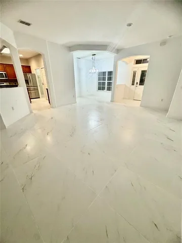 a view of a livingroom with wooden floor