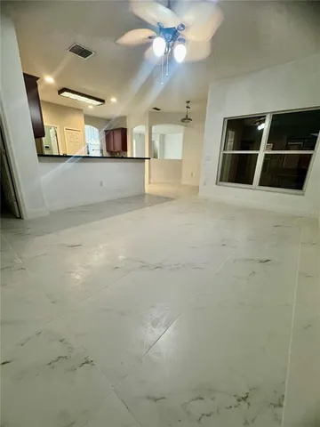 a view of a room with an empty space