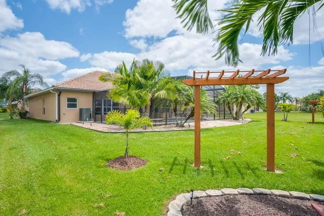 a house with palm tree in front of it