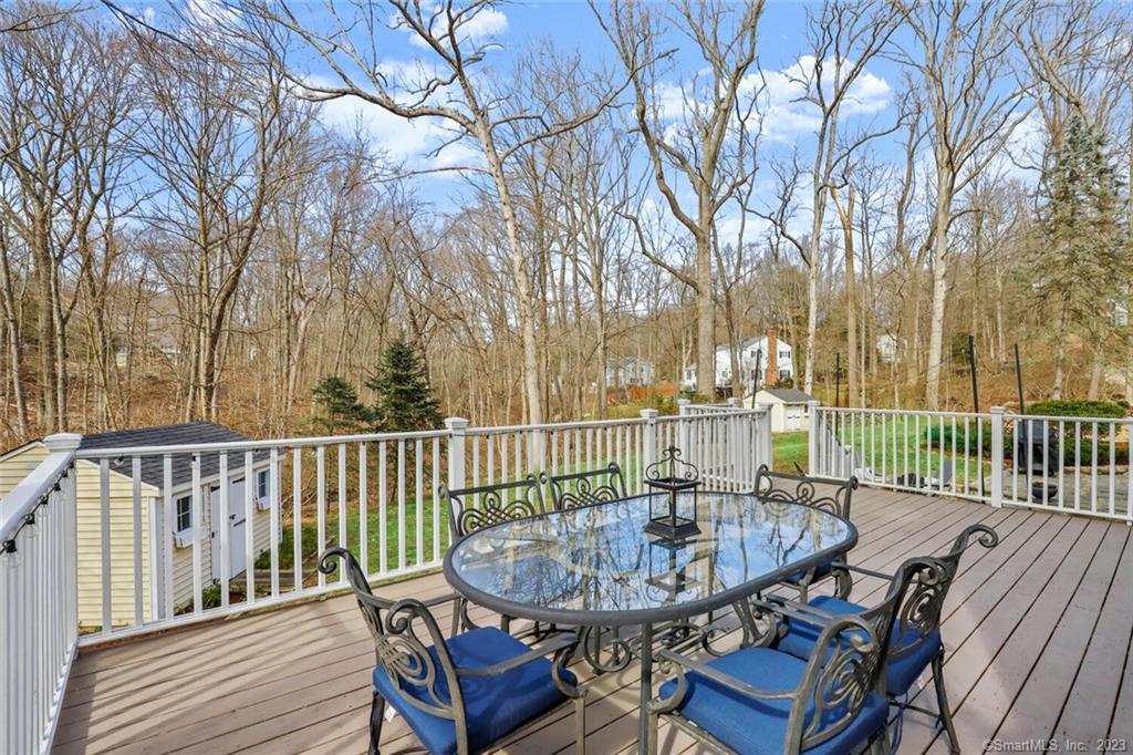 183 Frogtown Road New Canaan, CT 06840 - Photo 27 of 37 a view of a patio with a yard