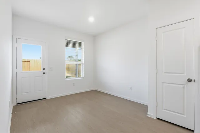 an empty room with windows