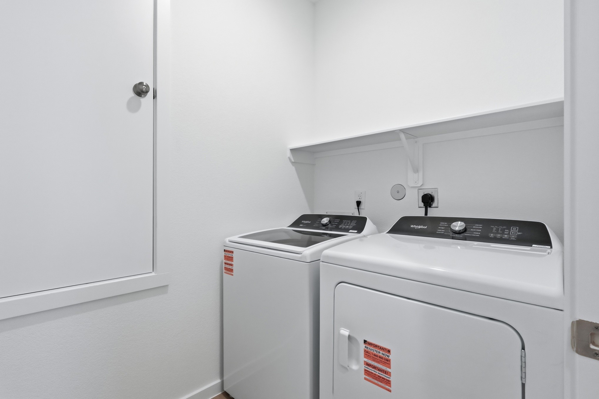 26299 Arrowleaf Drive Magnolia, TX 77355 - Photo 13 of 24 a utility room with dryer and washer