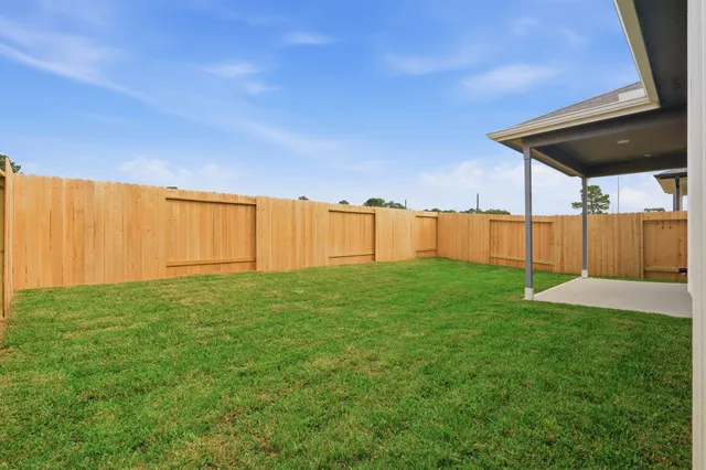 a view of yard with swimming pool