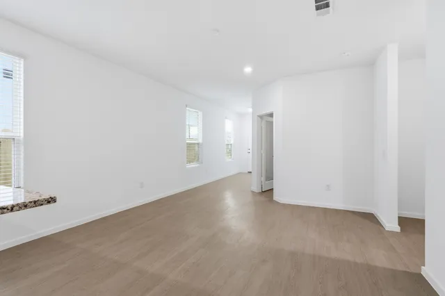 an empty room with windows