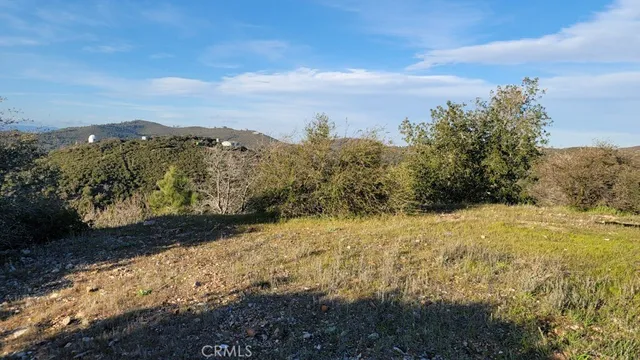 a view of mountain view with mountains in the background