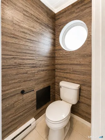 a bathroom with a toilet and a sink