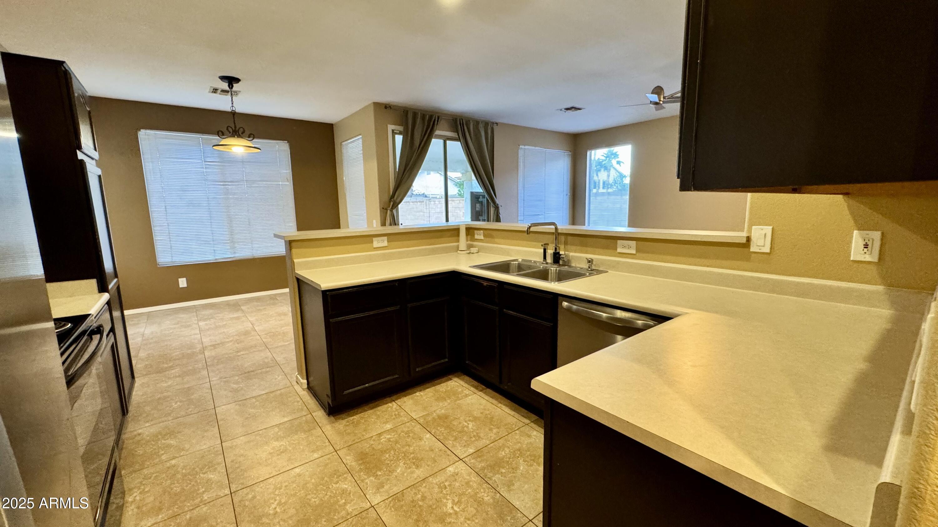 1362 W. Roadrunner Dr. Chandler, AZ 85286 - Photo 13 of 23 a bathroom with a sink vanity and a mirror