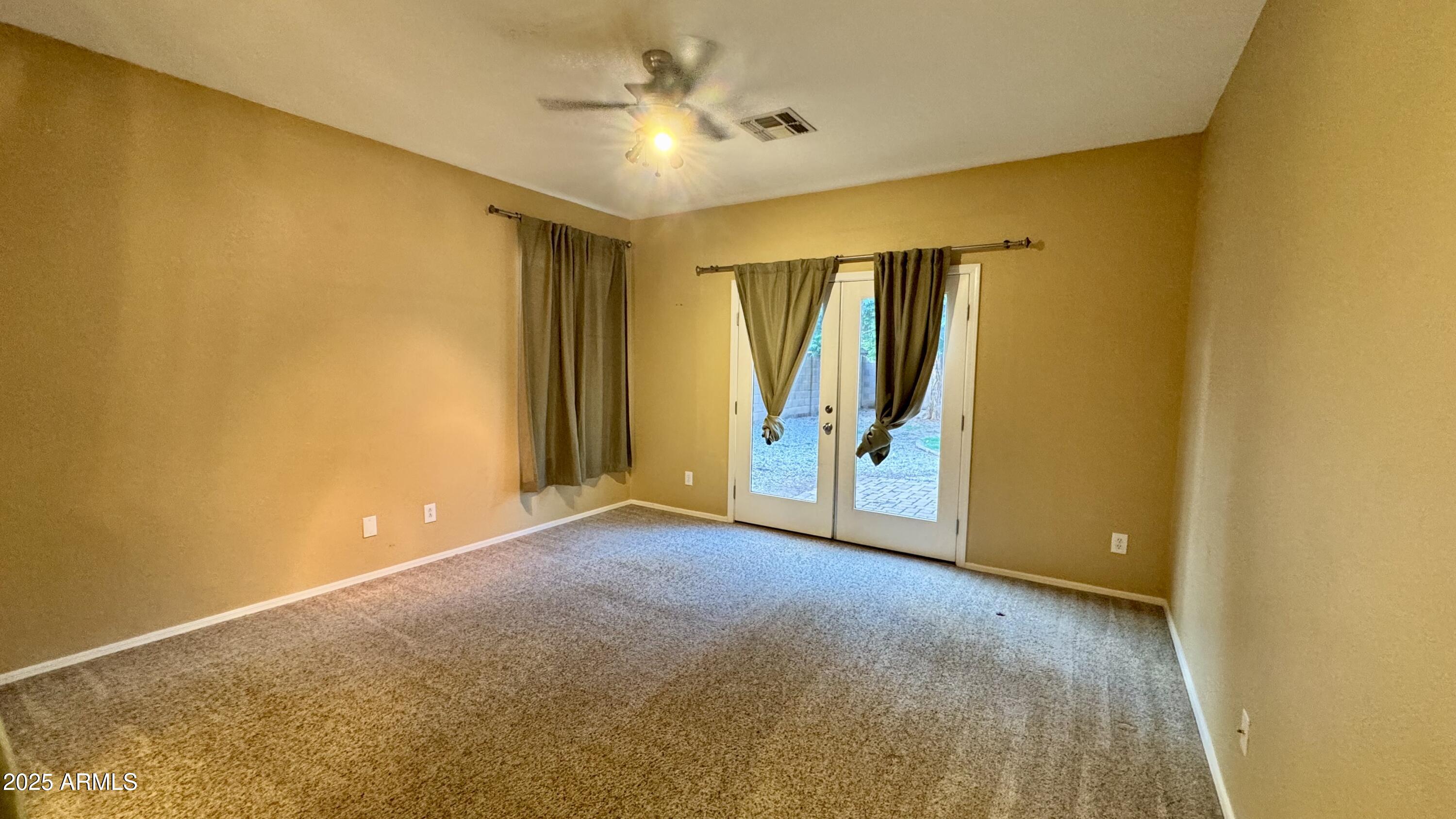1362 W. Roadrunner Dr. Chandler, AZ 85286 - Photo 15 of 23 a view of an empty room with a window