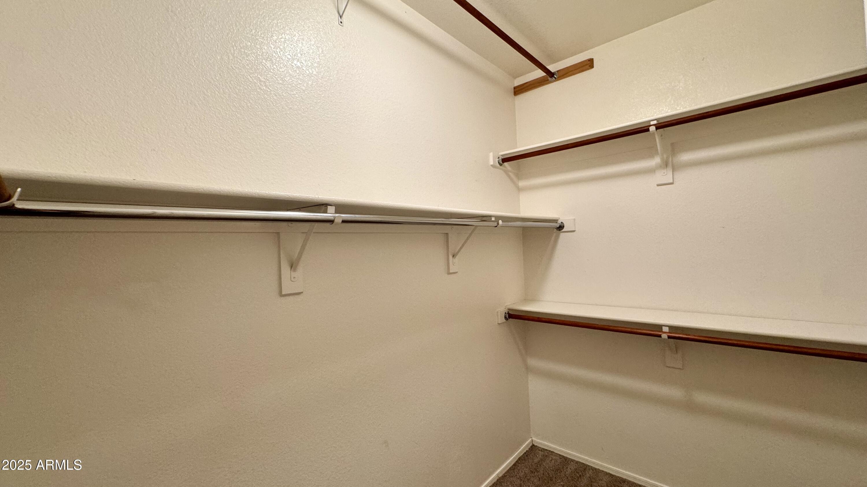 1362 W. Roadrunner Dr. Chandler, AZ 85286 - Photo 20 of 23 a view of a rack on the wall