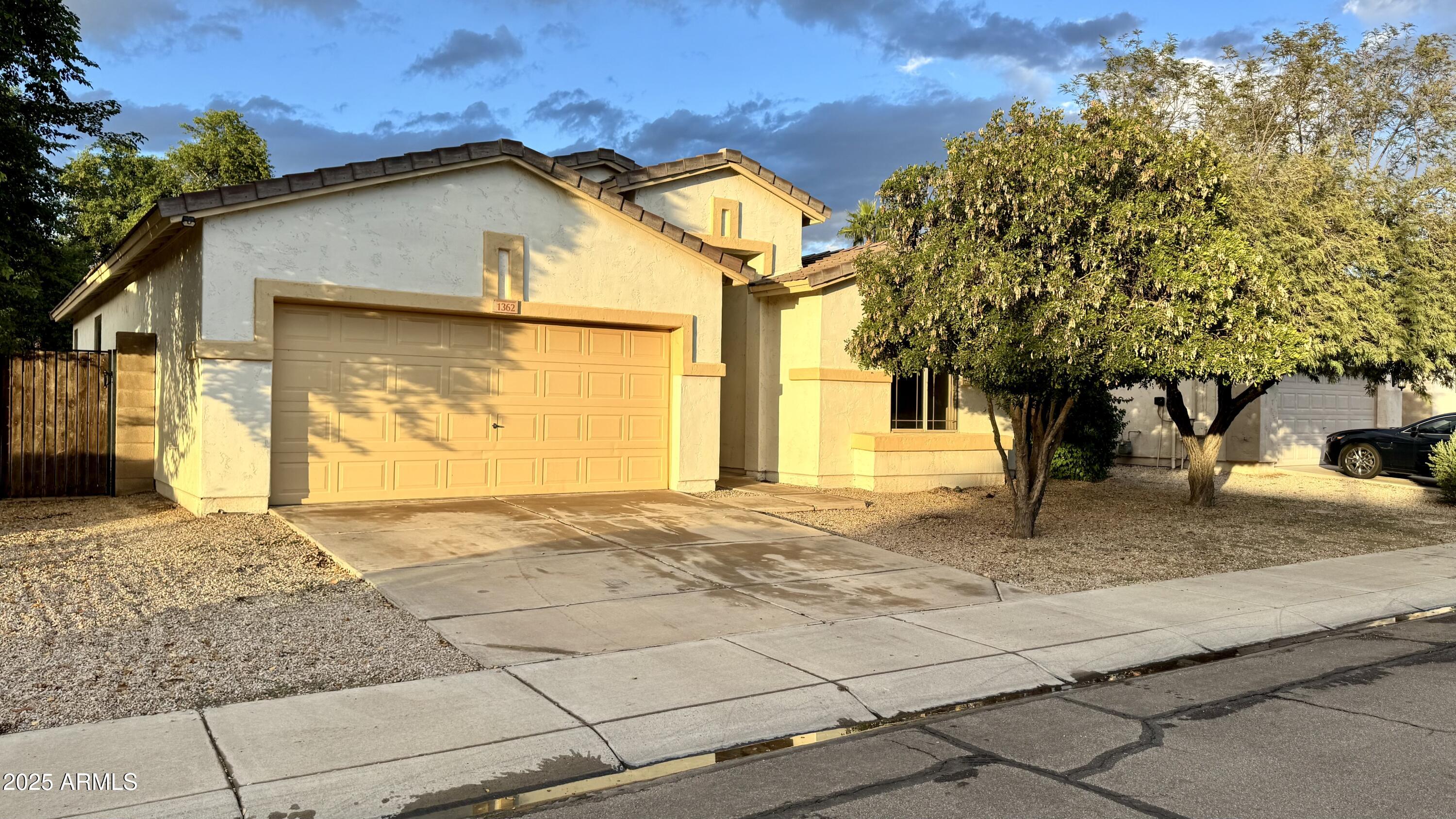 1362 W. Roadrunner Dr. Chandler, AZ 85286 - Photo 2 of 23 a view of a house with a yard
