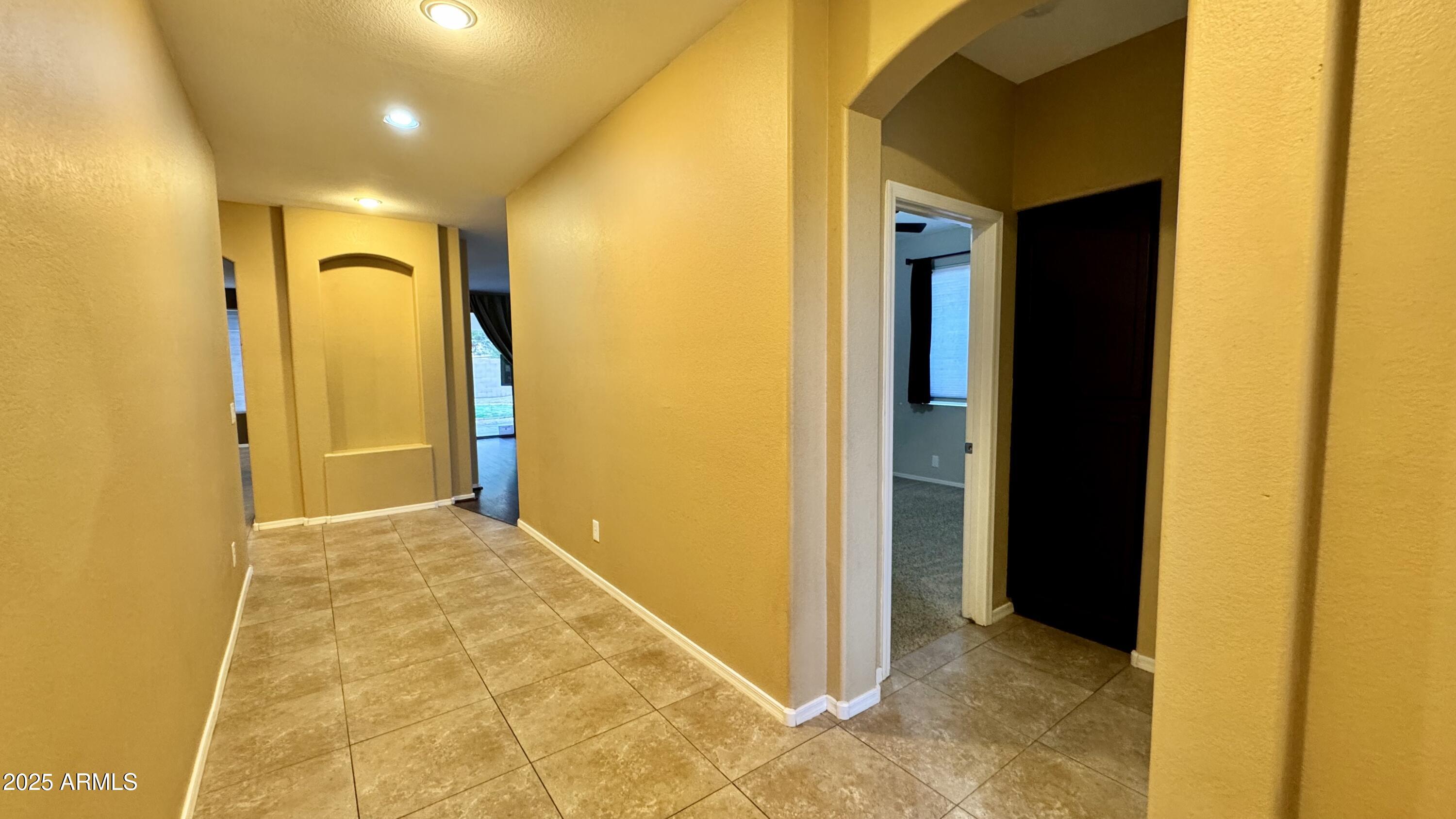 1362 W. Roadrunner Dr. Chandler, AZ 85286 - Photo 3 of 23 a view of a bathroom with a shower